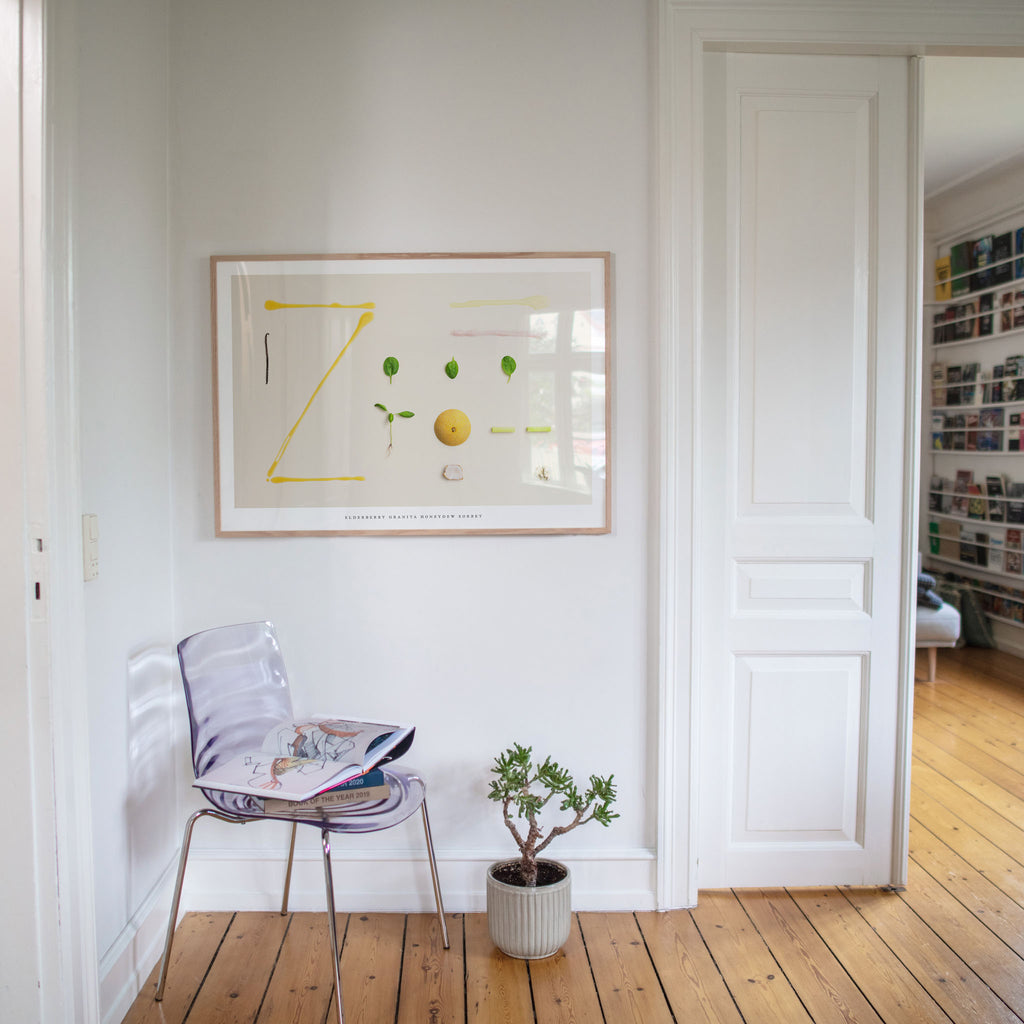 Elderberry Granita Honeydew Sorbet poster in modern interior with chair and plant