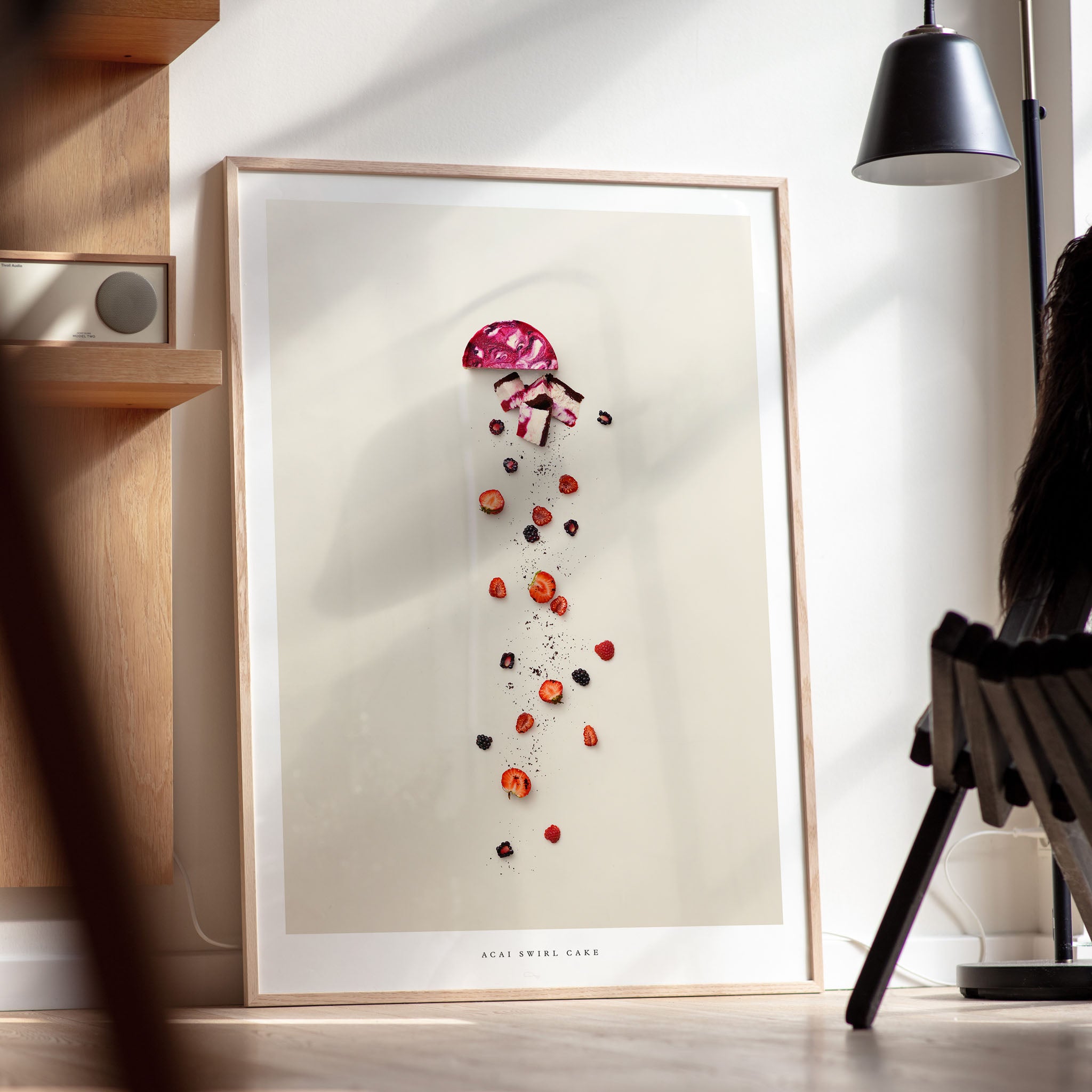 Acai Swirl Cake poster in modern room with wooden furniture and lamp
