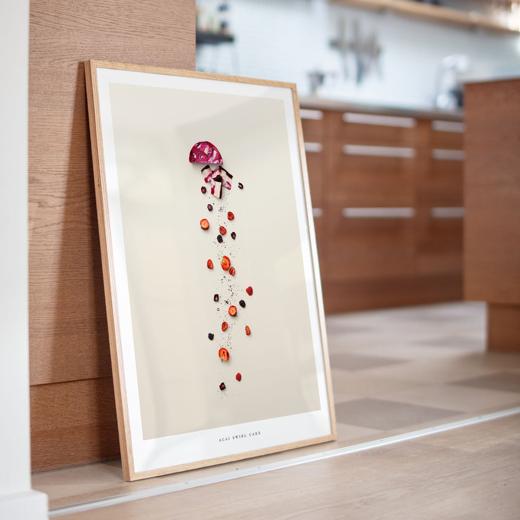 Acai Swirl Cake artwork with a decorative design on a wooden surface